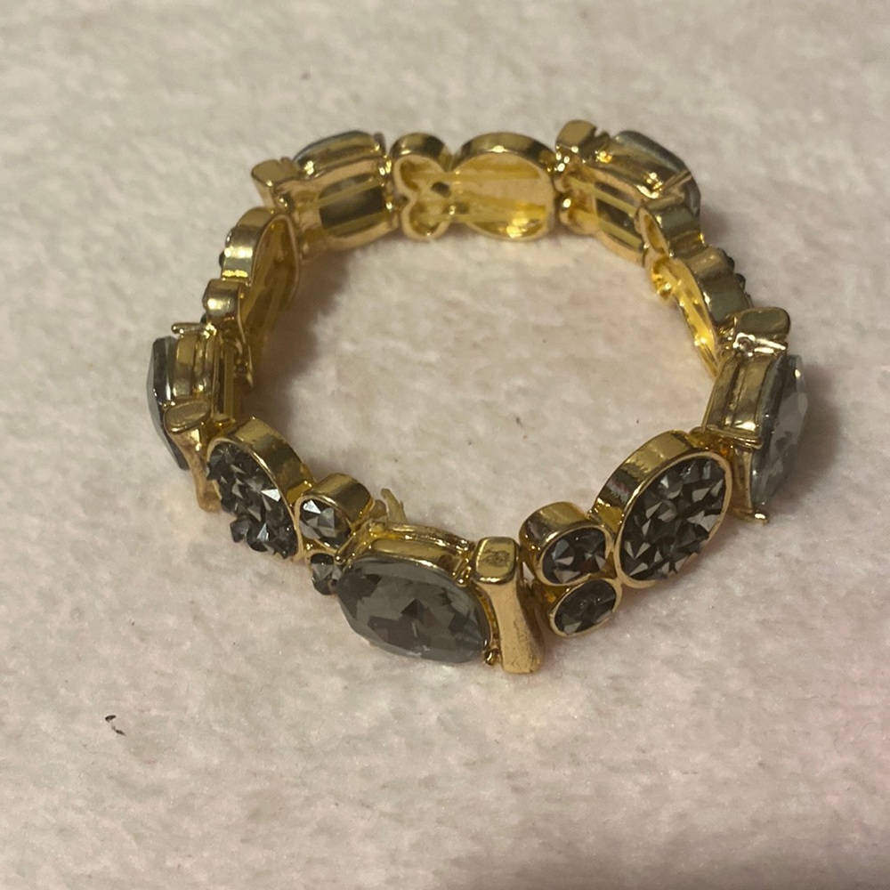 Gold and  black.   Stretch. Bracelet